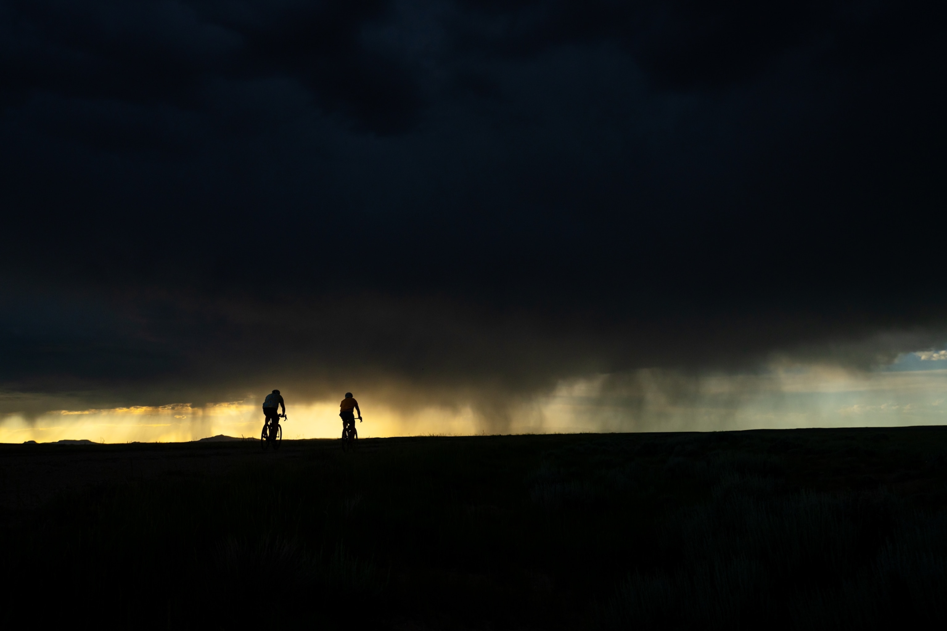 Honnold and Caldwell are biking at night