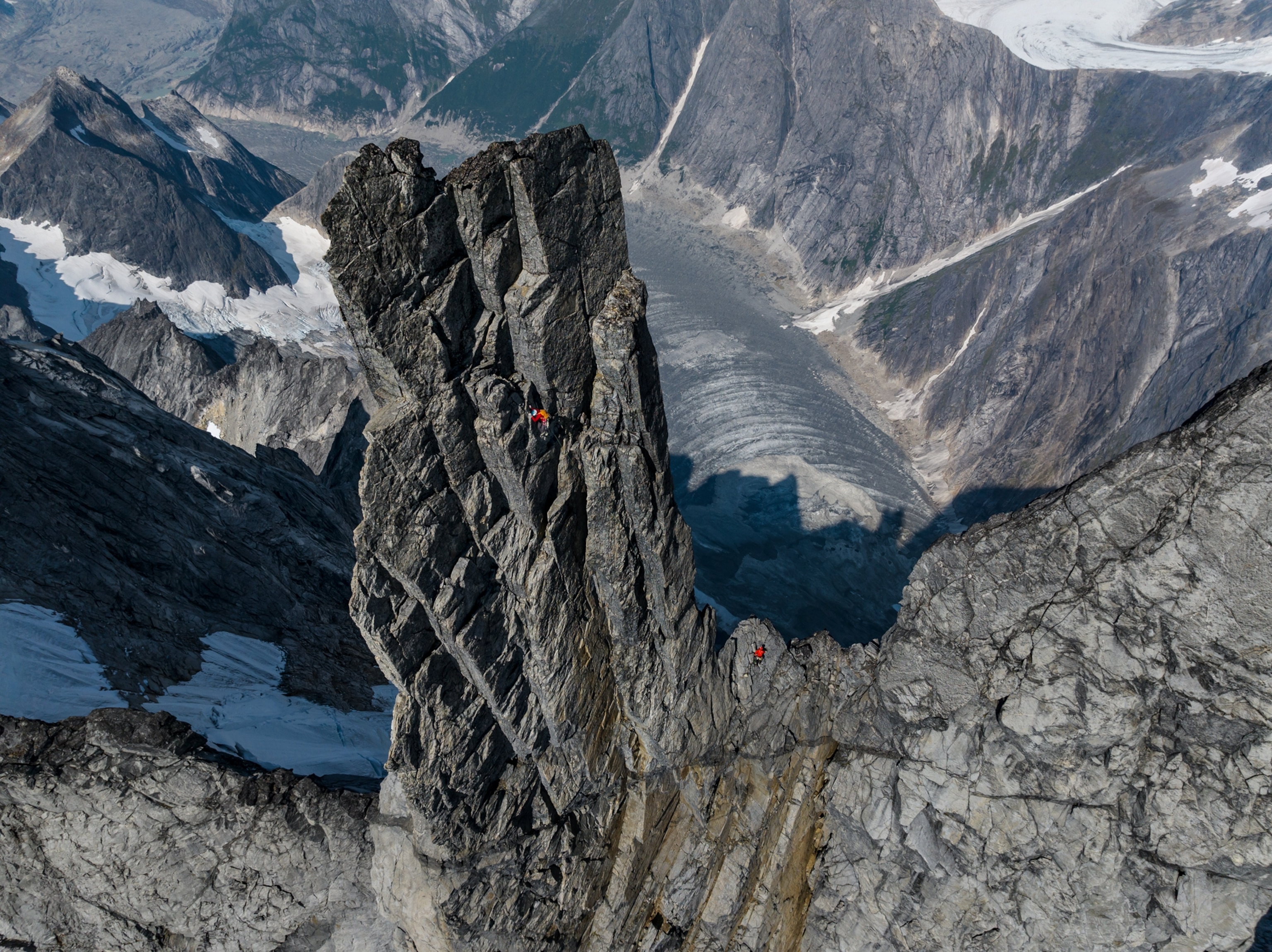 High angel shot of Honnold and Caldwell climbing