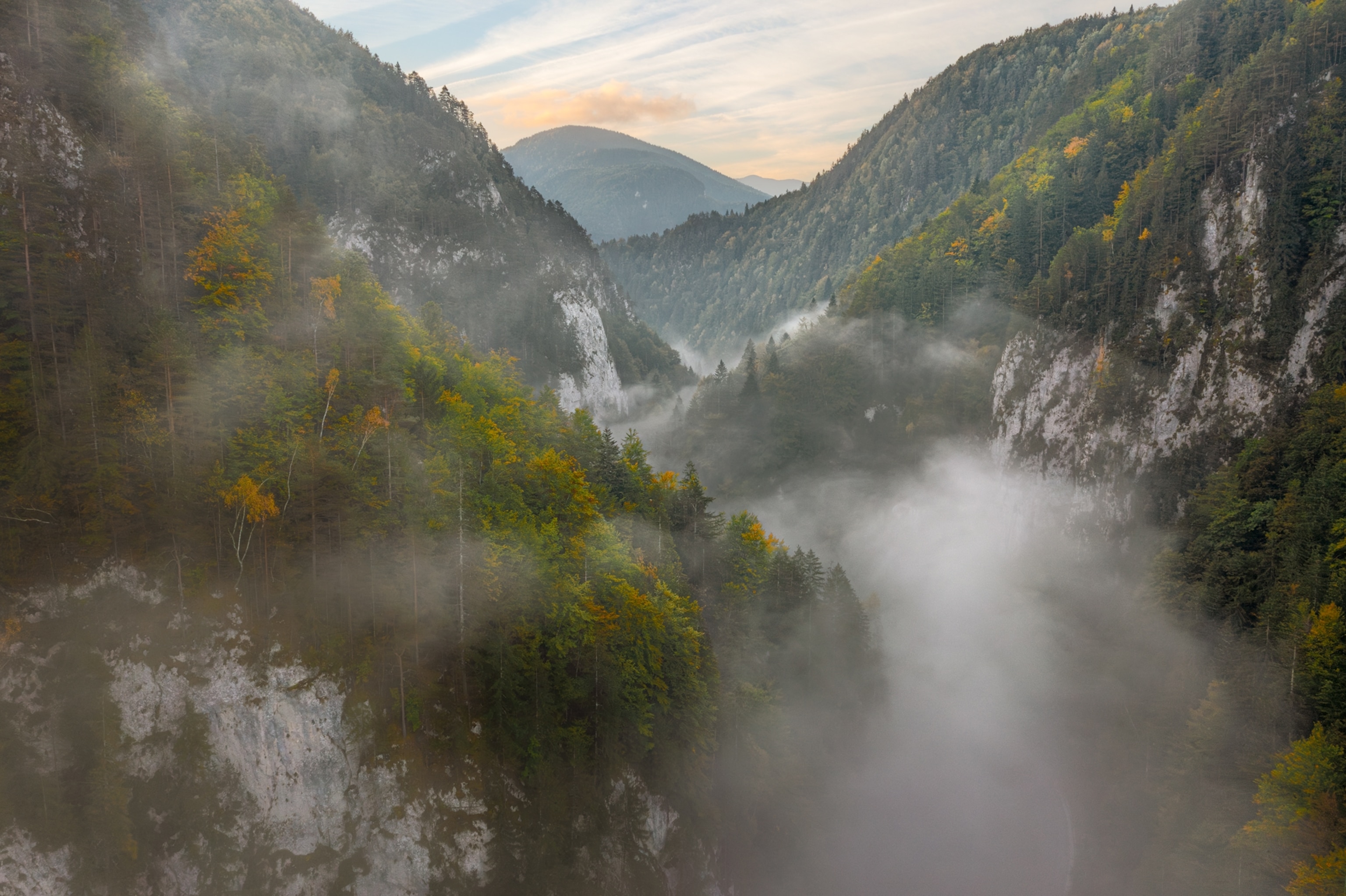 Carpathian Mountain range with with clouds in the valley